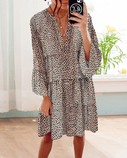 Ruby | Knielanges Damenkleid Mit Leopardenmuster Und Puffärmeln 3