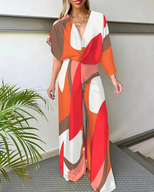 https://cdn.shopify.com/s/files/1/0780/0317/5769/files/KafzDames-Jumpsuits-Met-Korte-Vleermuismouw-Lange-Broek-Uit-n-Stuk-2023-Stevige-V-Hals-Strakke-Hoge.jpg?v=1743516676
